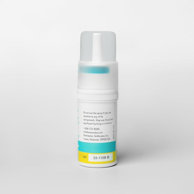Nasal spray bottle with label on a white background