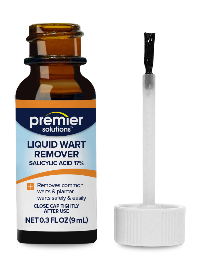 Liquid Wart Remover opened bottle with a cap brush beside it.